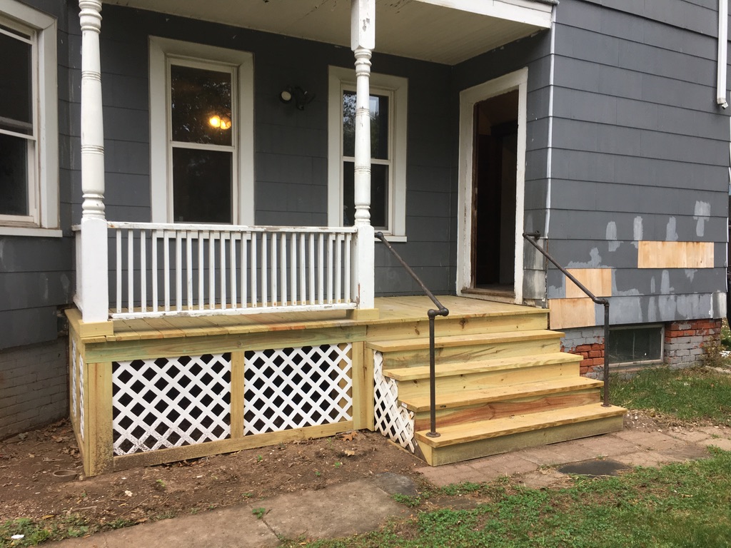 Newly built wooden porch and steps at 31 Wallace Street